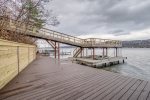 Lakefront deck with dock in the background